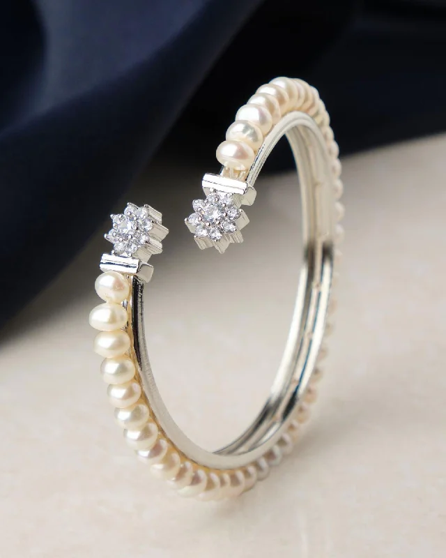 Sparkling crystal bangles for glamorous occasions-Floral Stone Studded Pearl Bangle