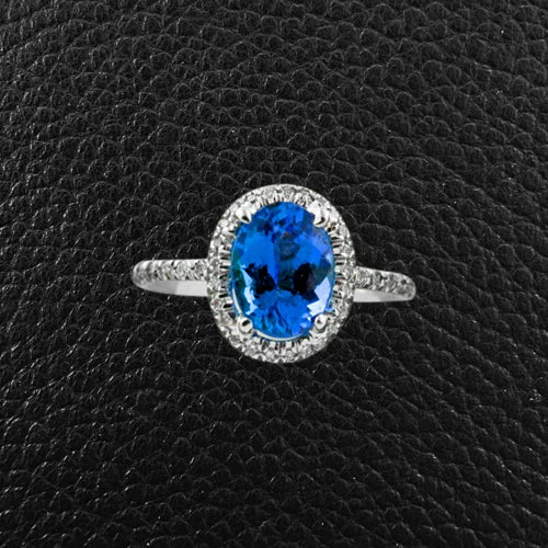 Bold statement rings for fashion-forward looks-Oval Tanzanite & Diamond Halo Ring