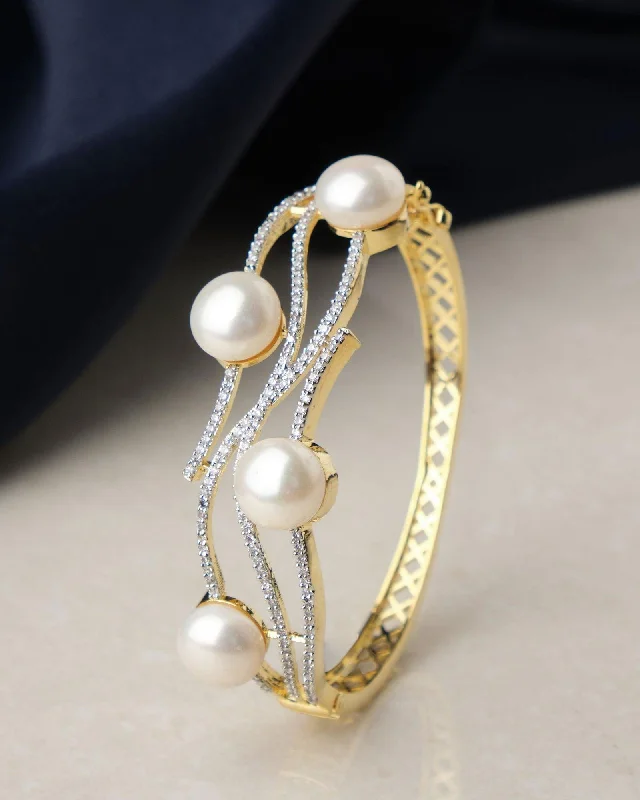 Bangles with floral accents for a feminine touch-Fashionable Pearl & Stone Studded Bangle