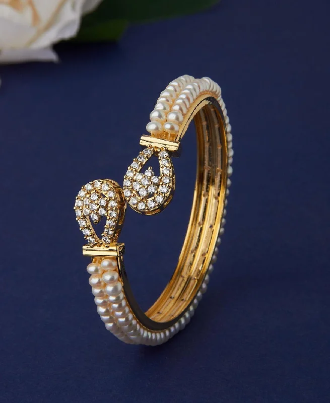 Multi-colored bangles for vibrant outfits-Stunning Stone Studded Pearl Bangle