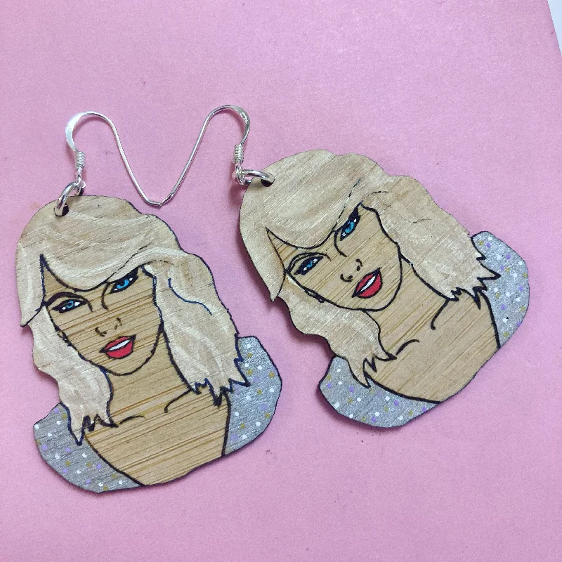 Sparkly stud earrings for adding glamour to your look-Dangles: Taylor Swift