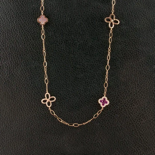 Custom charm necklaces for a personal look-Ruby & Diamond Clover Necklace