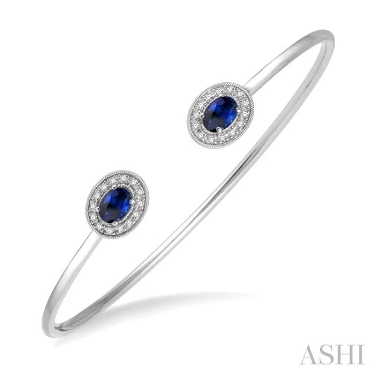 Gemstone-studded bangles for colorful style-1/5 Ctw Oval Cut 6x4mm Sapphire & Round Cut Diamond Precious Flexi Bangle in 14K White Gold