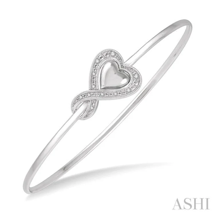 Simple silver bangles for timeless appeal-1/20 Ctw Twisted Heart Charm Round Cut Diamond Flexi Bangle in Sterling Silver