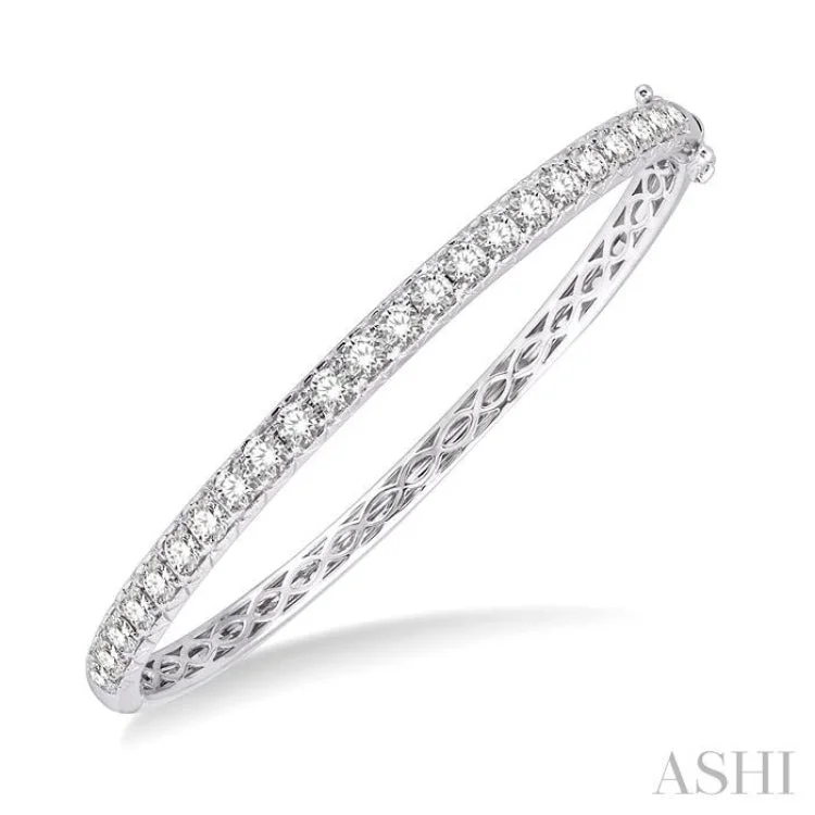 Wide bangles for a standout look-3 Ctw Round Cut Diamond Bangle in 14K White Gold