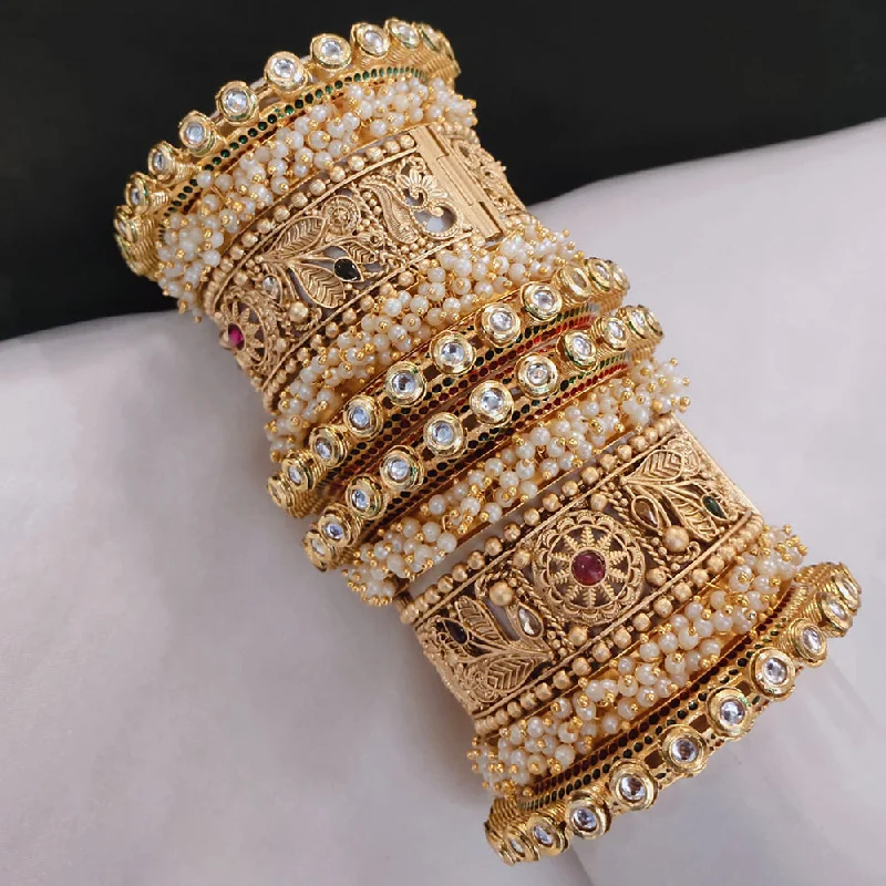 Minimalist bangles for a sleek and simple look-Pooja Bangles Gold Plated Kundan Stone And Pearls Openable Bangle Set