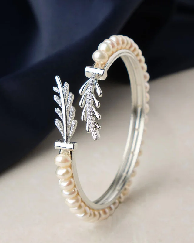 Luxury diamond bangles for upscale events-Leafy Stone Studded Pearl Bangle