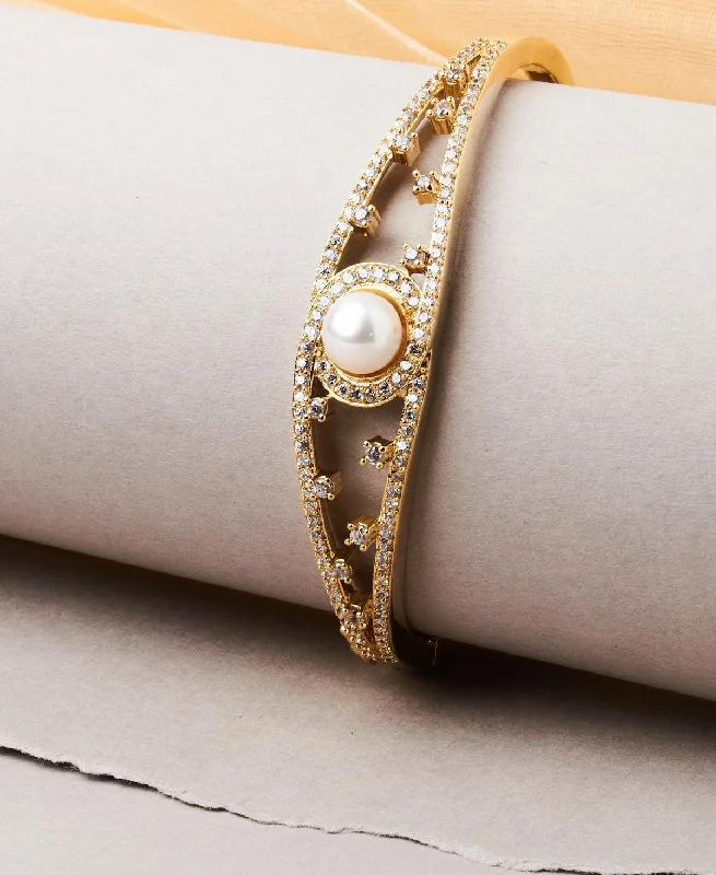 Bangles with floral designs for nature-inspired beauty-Elegant and classy Pearl Bangle