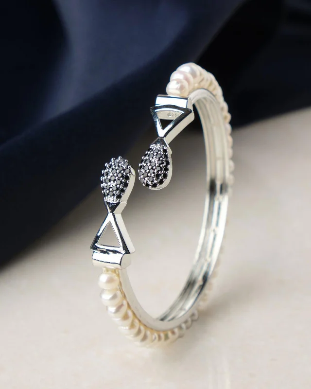 Silver bangles with intricate designs for elegance-Stately Stone Studded Pearl Bangle