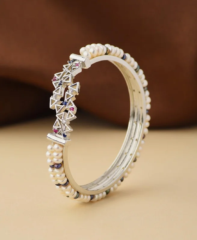 Custom-designed bangles for personalized flair-Stunning Stone Studded Pearl Bangle