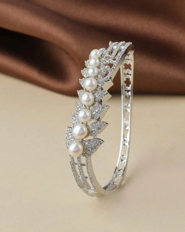 Luxury diamond-studded bangles for an upscale look-Stunning Stone Studded Pearl Bangle