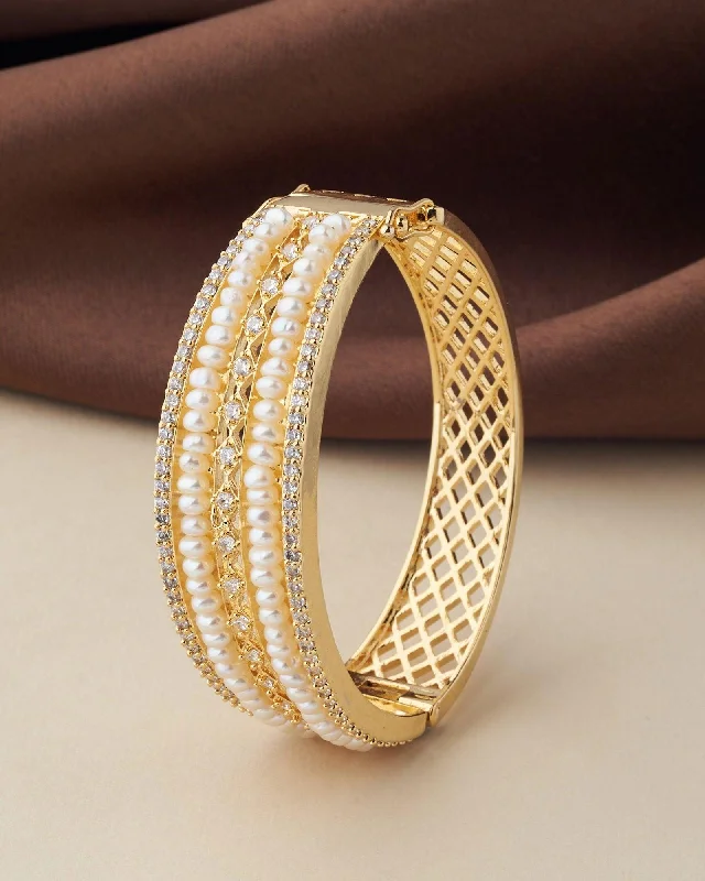 Designer bangles for high-end jewelry collections-Delightful Real Pearl Bangle