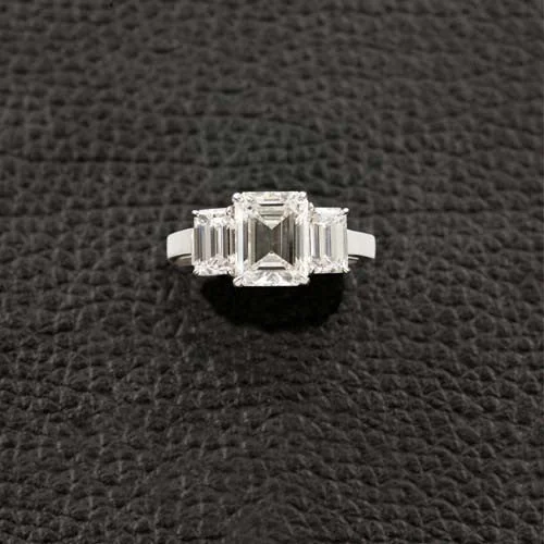 Trendy birthstone rings for stylish gifts-Triple Emerald cut Diamond Ring