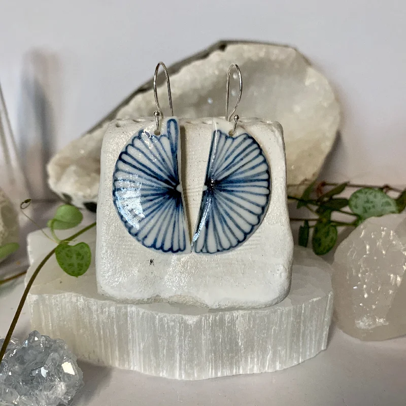 Handcrafted earrings for a unique style-Half moon indigo ‘flower’ porcelain earrings