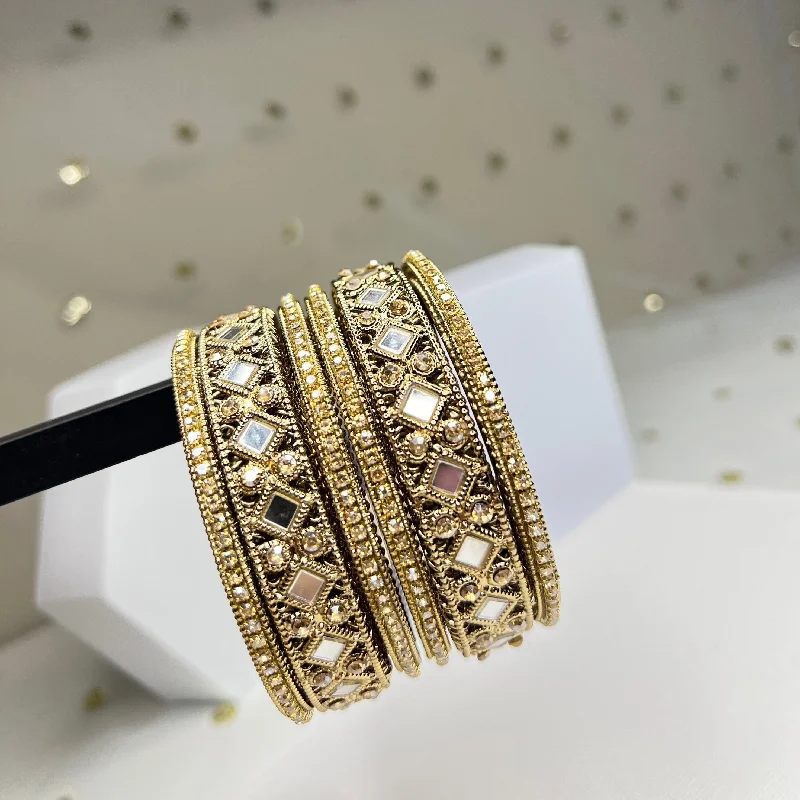 Fashion-forward gold bangles for a luxe feel-Kangan - Golden Bangles