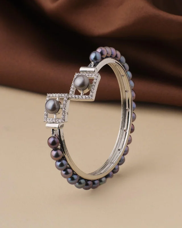 Boho chic bangles for laid-back fashion-Elegant and classy Pearl Bangle