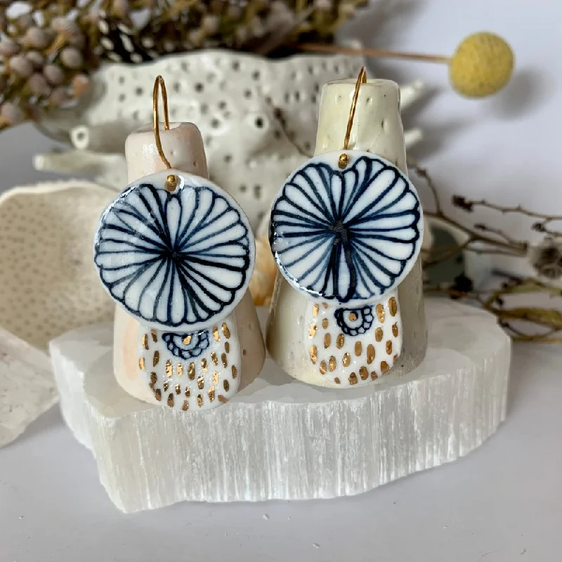 Wedding earrings for brides and bridesmaids-Blue and white hand painted porcelain earrings with gold lustre detail.