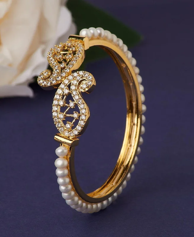 Gold-plated bangles for affordable luxury-Stunning Stone Studded Pearl Bangle