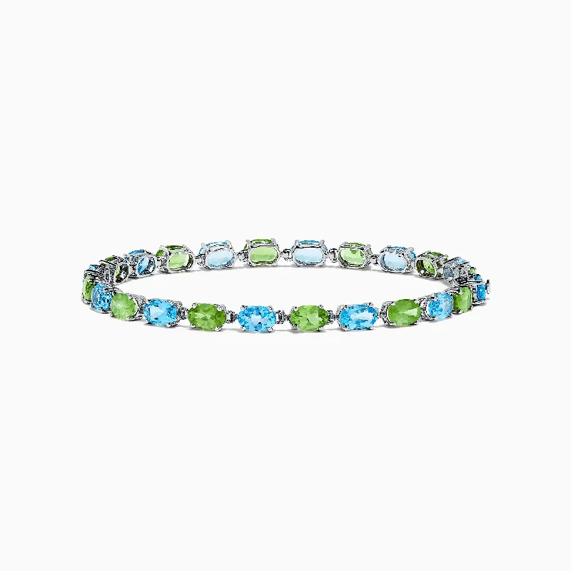 Bohemian bracelets for free-spirited fashion-14K White Gold Blue Topaz and Peridot Tennis Bracelet, 13.80 TCW