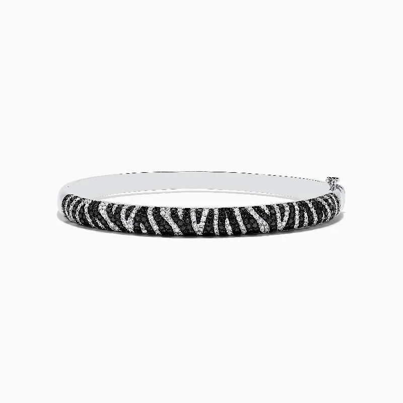 Luxury leather bracelets for an upscale look-14k White Gold Black and White Diamond Zebra Print Bangle