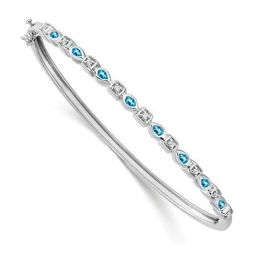 Classic gold bangles for timeless elegance-14KT WHITE GOLD BLUE TOPAZ AND DIAMOND BANGLE