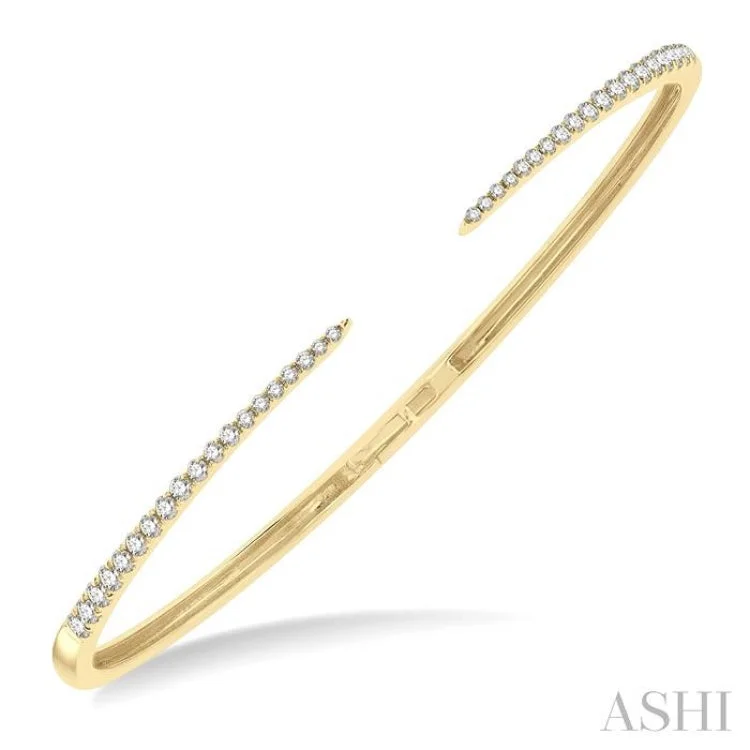 Minimalist rose gold bangles for a modern touch-1/2 Ctw Round Cut Diamond Claw Cuff Bangle in 14K Yellow Gold