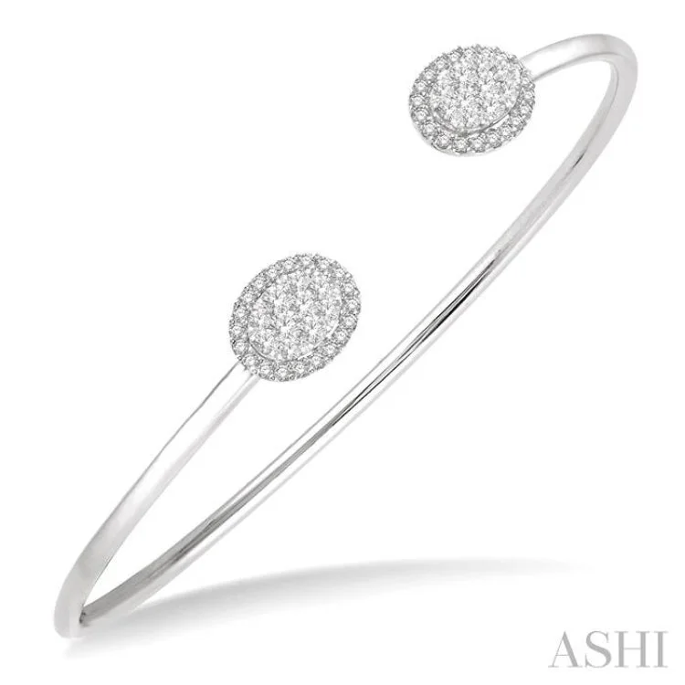 Elegant bangle sets for fashionable arm candy-5/8 Ctw Oval Shape Lovebright Open Cuff Diamond Bangle in 14K White Gold