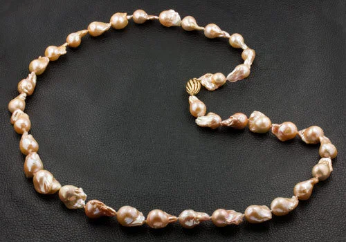 Elegant layered necklaces for fashion-forward looks-Peach Color Baroque Pearl Necklace