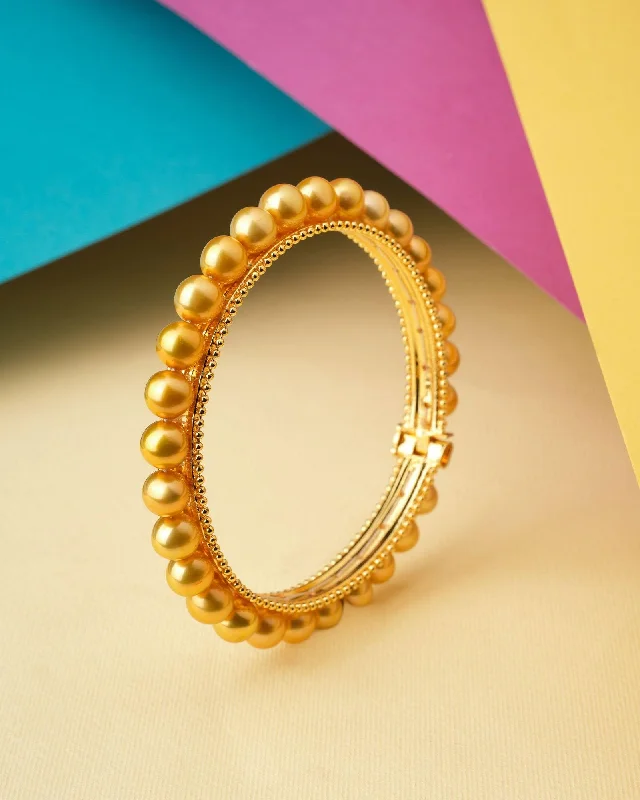 Classic gold bangles for every occasion-Elegant Pearl Bangle