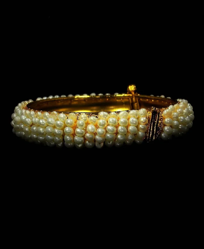 Fashionable bangles for casual everyday style-Elegant and classy Pearl Bangle