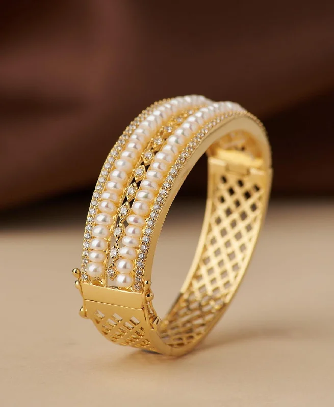 Multi-tone bangles for mixed metal fashion-Delightful Stone Studded Real Pearl Bangle