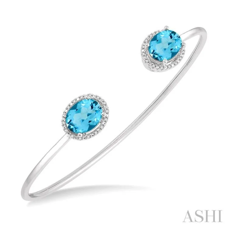 Custom engraved bangles with your name-1/10 Ctw Oval Shape 9x7mm Blue Topaz & Round Cut Diamond Bangle in Sterling Silver