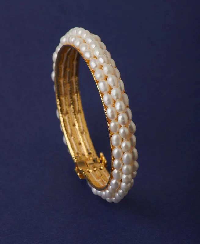 Trendy bangle bracelets for daily wear-Elegant Golden White Pearl Bangle