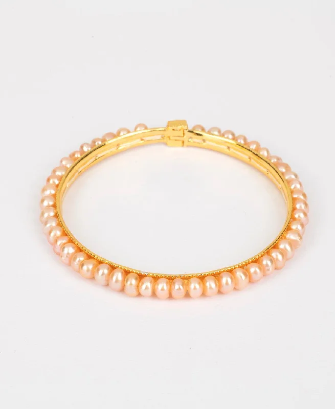 Elegant gold bangles for special occasions-Classy Pink Pearl Bangle